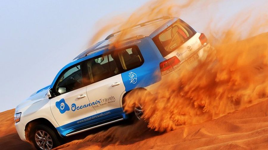 Abu Dhabi: Desert Safari with BBQ, Camel Ride & Sandboarding