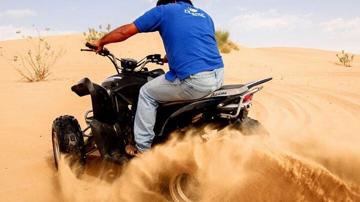 Dubai Desert Safari Tour with Quad Bike for 60mins & BBQ Dinner.