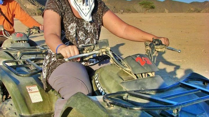 Quad sunset with barbecue and camel riding in Marsa Alam