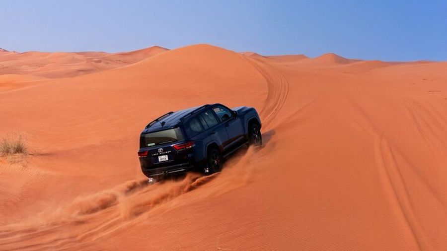 VIP Dubai Desert Safari, Sandboarding Camel Ride and BBQ Dinner