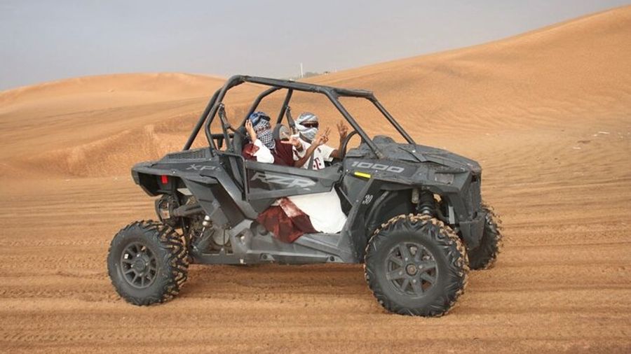 Dubai Desert Safari with ATV Riding & Unlimited Buffets & BBQ