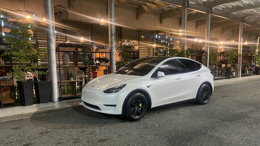 Transfer in Tesla from SDQ Airport to Santo Domingo