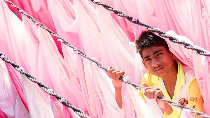Dabbawala, Dhobi Ghat, and Dharavi Tour with Local Train Ride