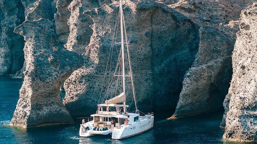 Luxury Santorini Catamaran Cruise: Lunch, BBQ, Drinks, Transfers
