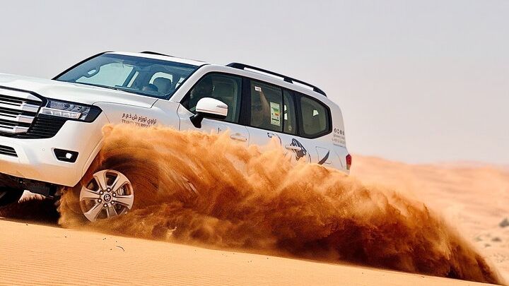 Dubai Desert Safari, Sandboard, Camel Ride and BBQ Dinner