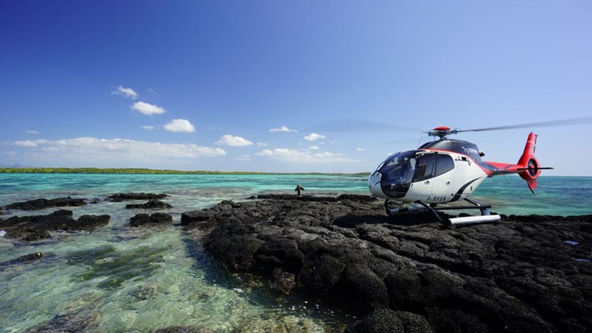 10-minute helicopter flight over the Grand Bay Area from North Helipad