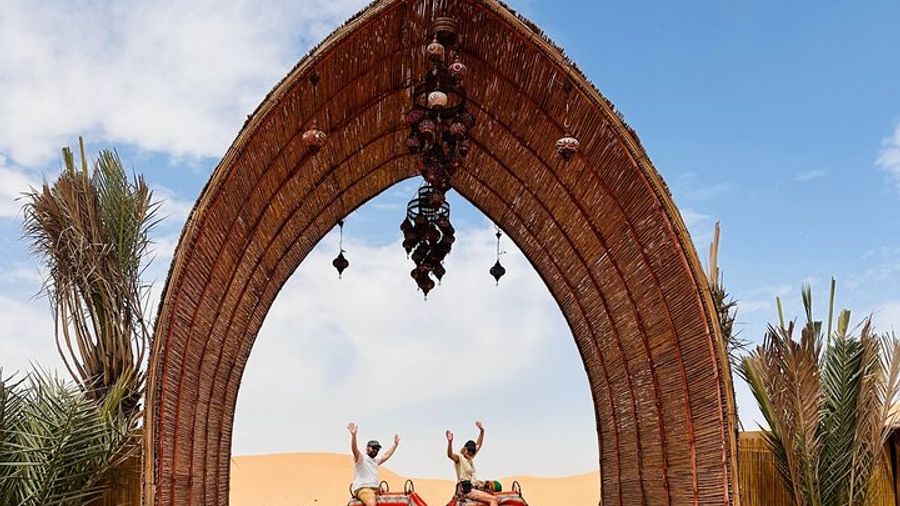 Abu Dhabi Desert Safari with Camel Ride BBQ Dinner and Live Shows