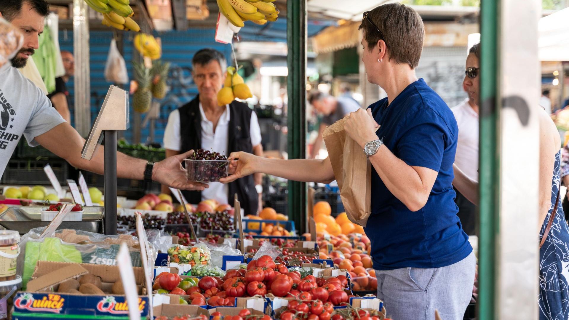 Market visit and dining experience at a local's home with cooking demo and wines included in Parma