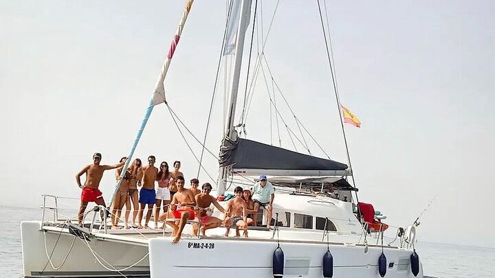 Half-Day Catamaran Tour with Dolphin Watching and Snorkeling