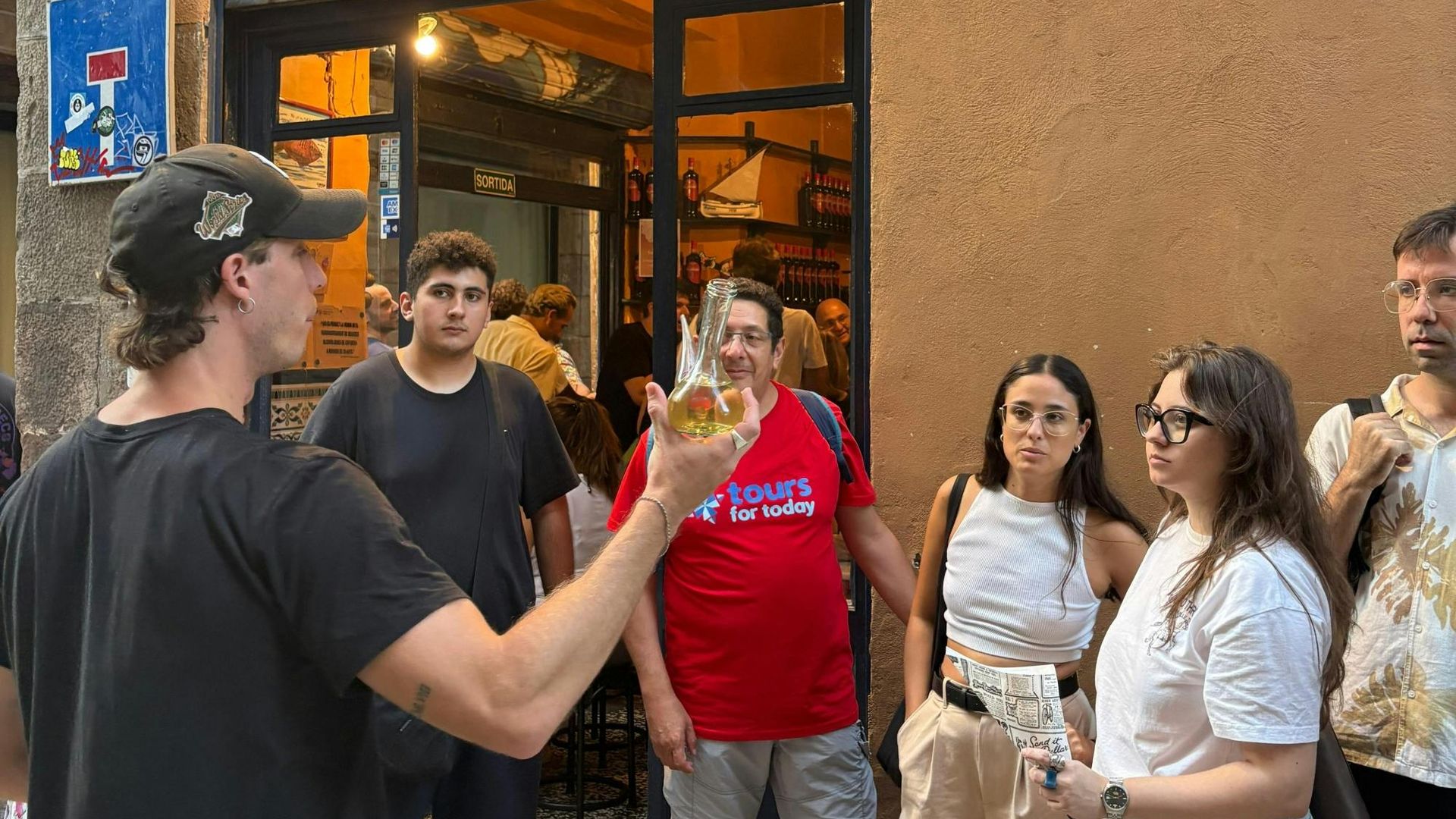 Barcelona district tour with traditional tapas tasting