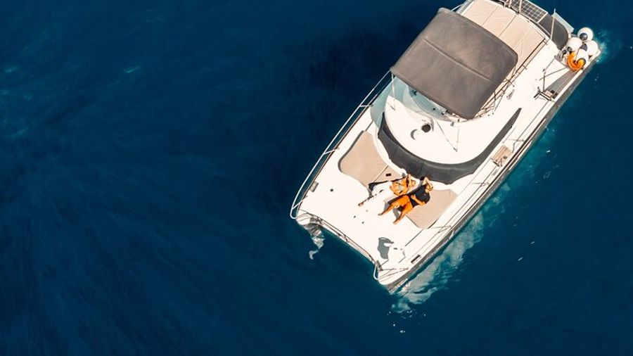 Santorini Private Catamaran Cruise with Food and Open Bar