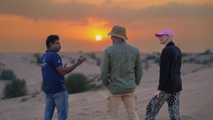Dubai Sunset Desert Safari with Sandboarding and Camel Ride