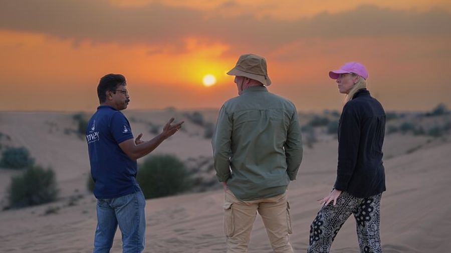 Dubai Sunset Desert Safari with Sandboarding and Camel Ride