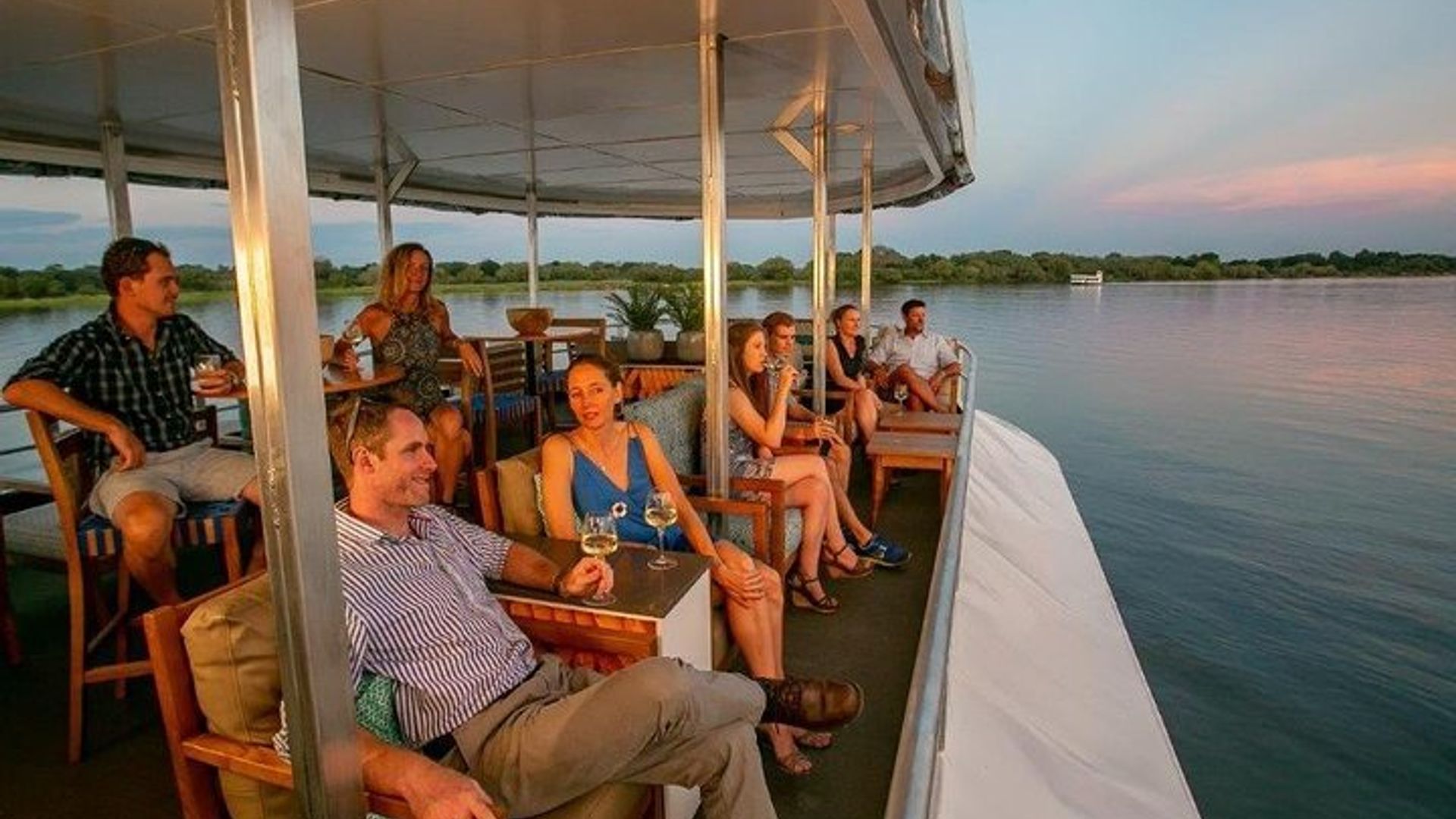 Ubwato bwa Zambezi izuba rirenze (Zimbabwe, Victoria iragwa)