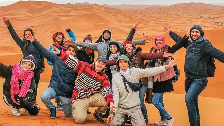 Dubai Desert Safari Camel Ride Sand Boarding BBQ Dinner